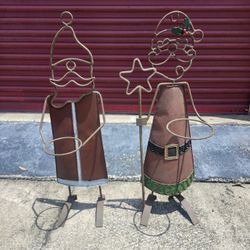 Pair Of Metal Santa Claus Plant Holders