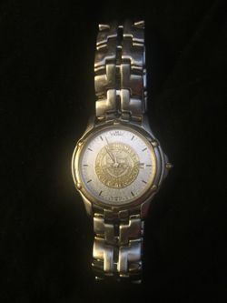 Rose Hulman Institute of technology retirement watch with crest worth 400