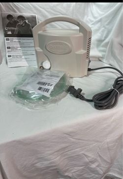 DeVilbiss air compressor with nebulizer. Unopened. Sealed