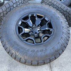18" OEM Dodge Ram TRX Black 2024 Stock Wheels Rims Toyo Open Country AT 3 Factory Tires 37” Inch