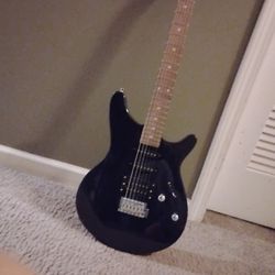 Rogue dark purple guitar
