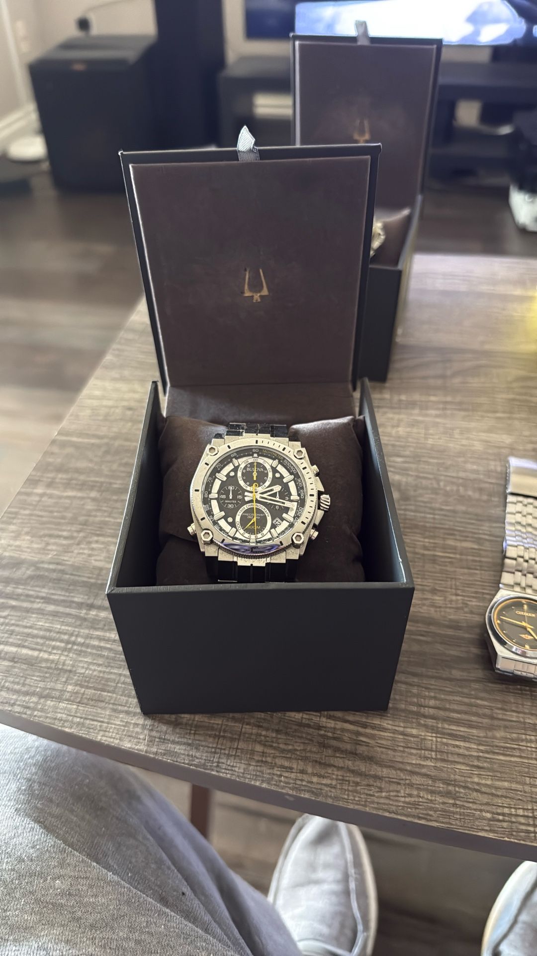 Bulova Precisionist Icon 262hz I have the gold Precisionist Icon. It's a heavy beautiful watch. I love how accurate it is. I sized it myself and it f
