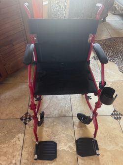 Light weight Transport Wheel chair like new