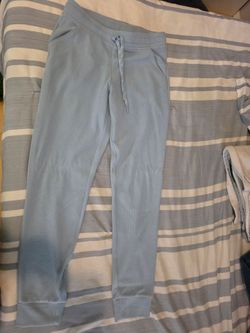 Polyester, blue pants.