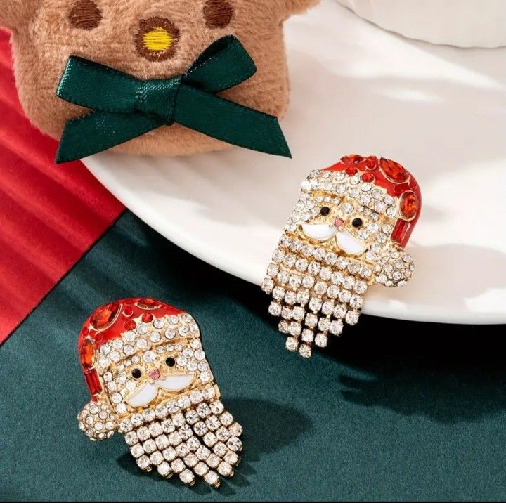 "Jolly Jingles: Cascading Crystal Santa Statement Studs"