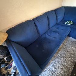 Blue suede couch