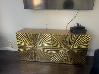 Gold coated living room cabinet