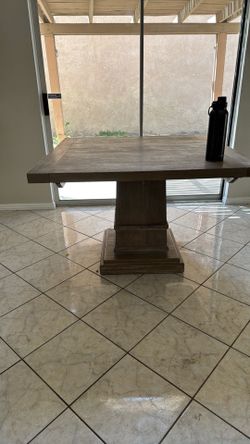 Pedestal dining table