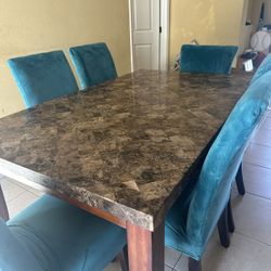 Marble  Table With Six Chairs $300