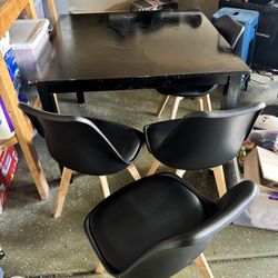 Black Table with Four Chairs