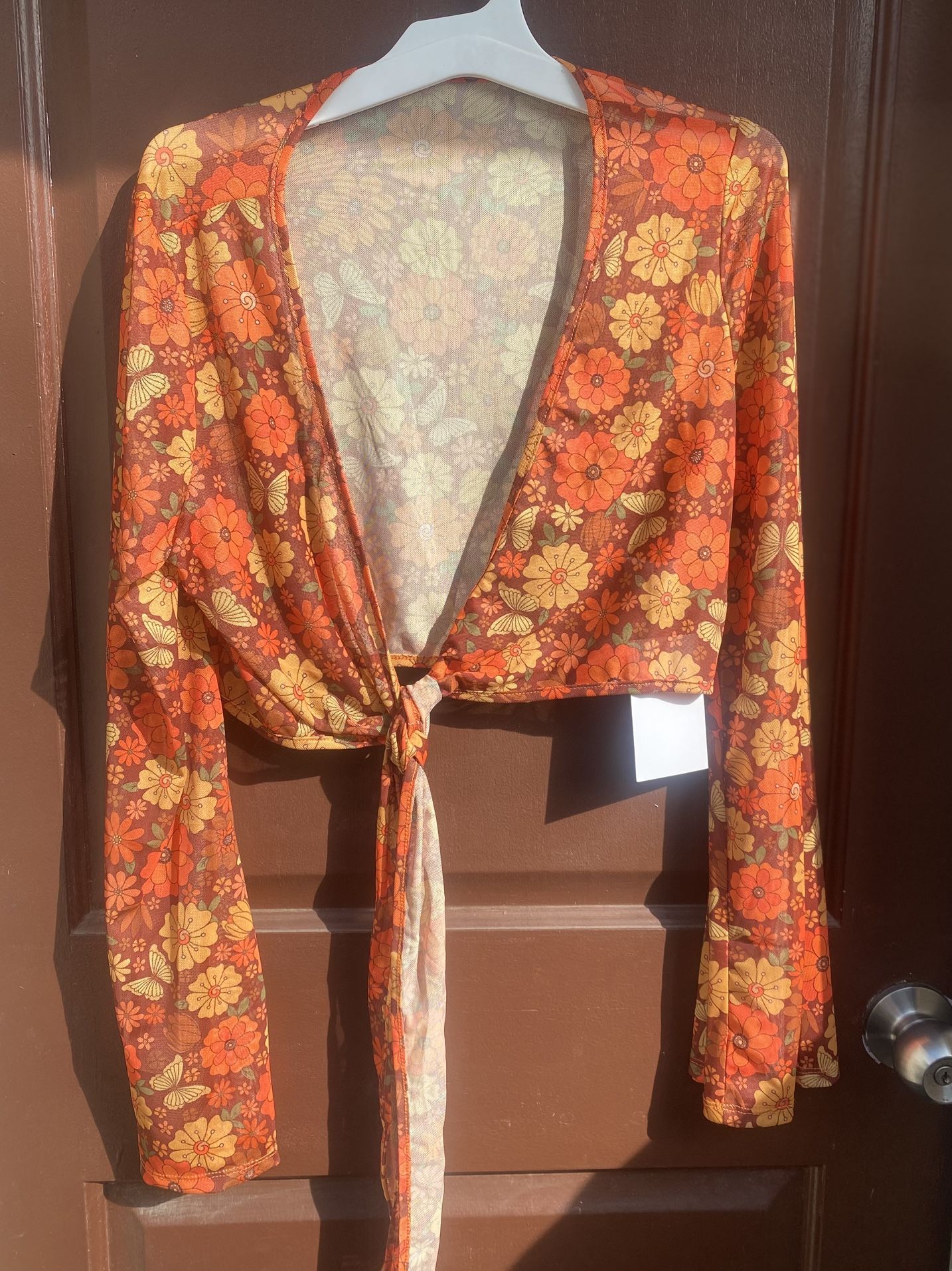 Halloween Hippie Suede Fringe Vest And Flare Pants With Peace Sign Earrings.