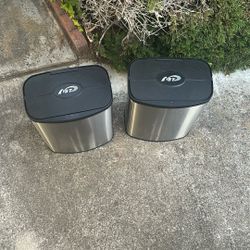 two motion sensor trash cans