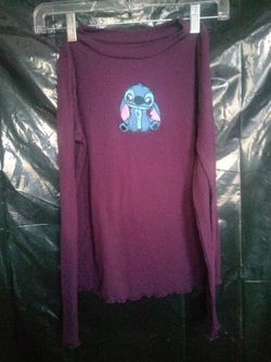 Long Sleeve Crop Top Features A Graphic Of The Character Stitch On The Chest. Size M ( 10 12 ).