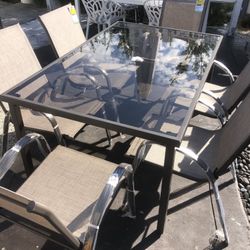 Outdoor Patio Tempered Frosted Glass NEW Table With 6 Outdoor Patio Aluminum Stackable NEW Chairs 