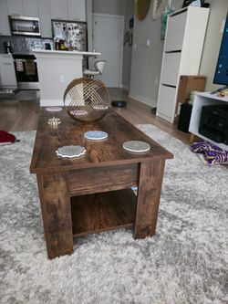 Rustic dark brown coffee table with shelf