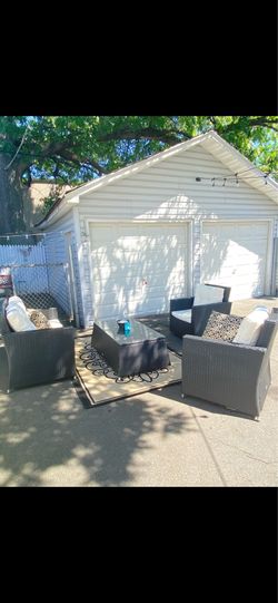 Non-negotiable just the furniture and the cushions that come with the furniture, $50 more for the two extra pillows and the rug this furniture has bee