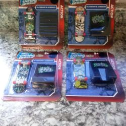 4 Tech Deck Skateboards 