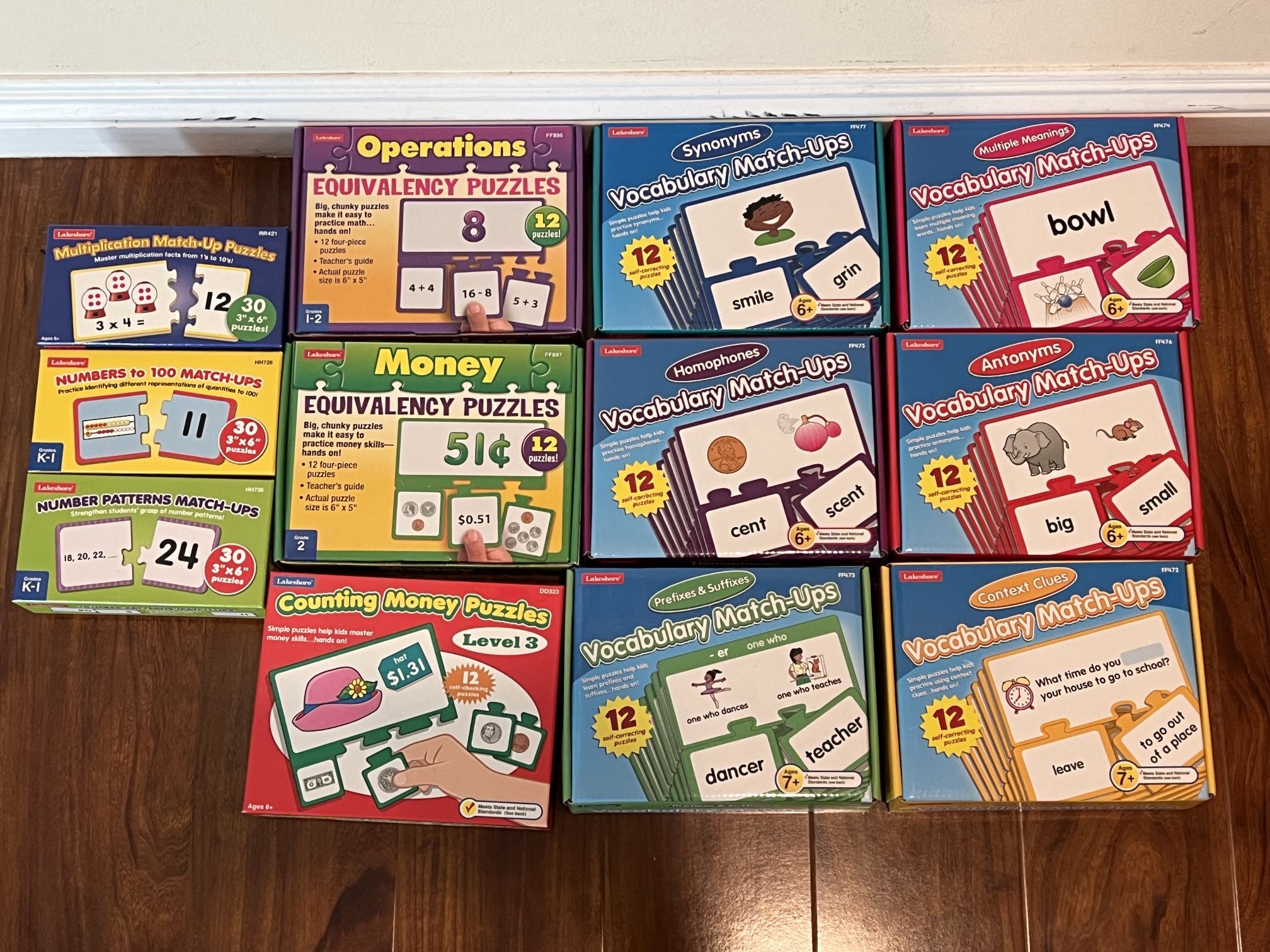Lakeshore Learning puzzles: Vocabulary Match-Ups - Complete Set, Operations, Money, Counting money, Multiplication, Numbers to 100, Number patterns