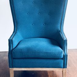 Pier one wingback chair. Hardly used. Purchase a few months back..Like new