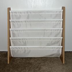 Used 4 Teir Book Rack with Toddler Books $5