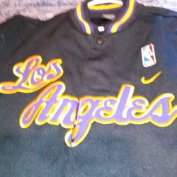 BRAND NEW W/TAGS LOS ANGELES LAKERS JERSEY. IN EXCELLENT CONDITION. RARE.