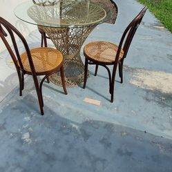 round table with 3 chairs 36x30 the brand of the chairs is Bentwood Thonet Cane Chair 