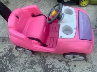 Kids pushing cart
