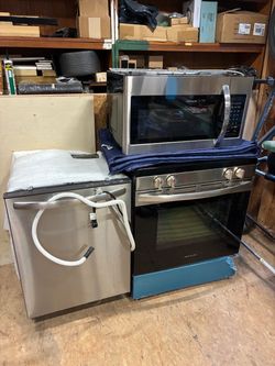 Frigidaire range, microwave and dishwasher