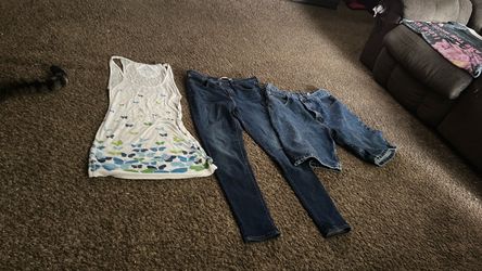 Clothes: tang top shirt, jeans, jean shorts