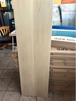 6.5MM 100% WATERPROOF SPC RIGID CORE LUXURY VINYL PLANK LONG 60”PLANK FLOORING WITH PAD ATTACHED. GREAT FOR KIDS AND PETS . ON HAND ! READY 4 Pk Up