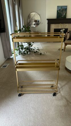 Gold roller cart on castors
