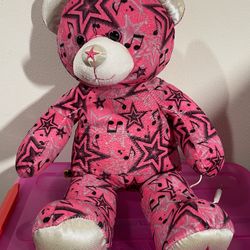 This item is a Build-A-Bear Workshop Speaker Starz Pink Star Music Plush teddy bea