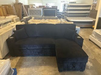 Black couch with pull out bed