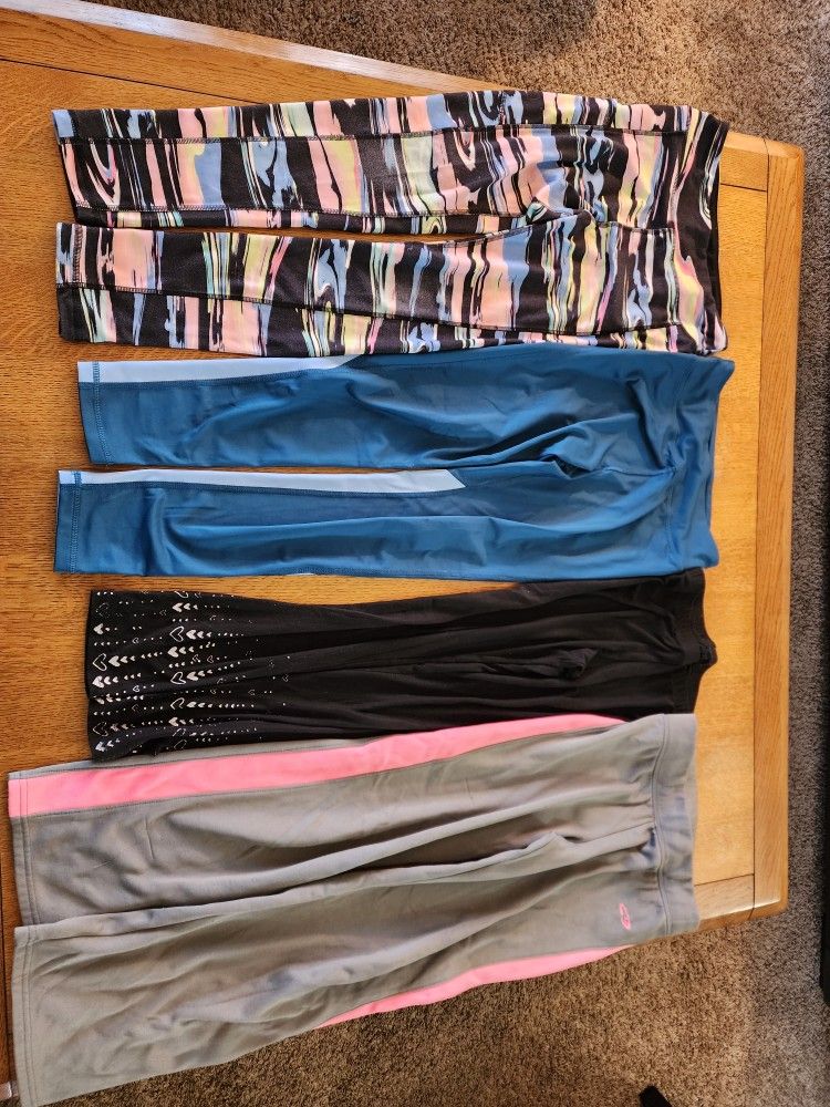 Girls 10-12 leggings and one pair of pants.