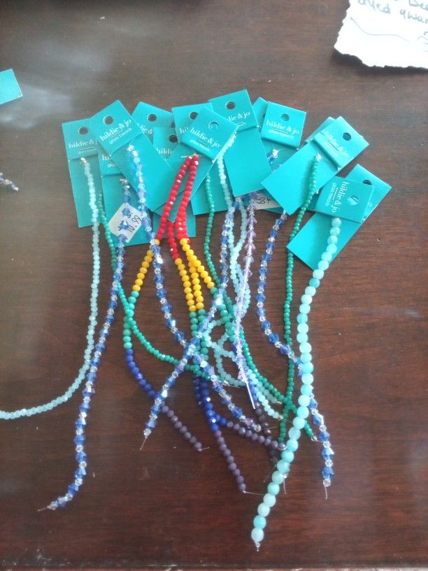 23 Strands Of Beads