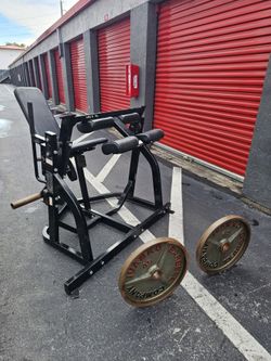 For ONLY $650 Hammer Strength plus pair Weight plates / 45 Pounds each. Delivery fee. Miami 33130