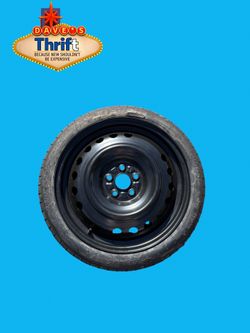 🚗 Brand New OEM Toyota Corolla Temporary Spare Tire & Wheel (Donut) – Never Used
