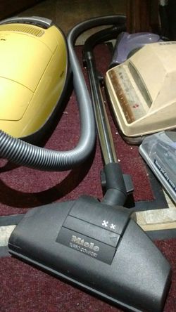 Miele canister vacuum used.