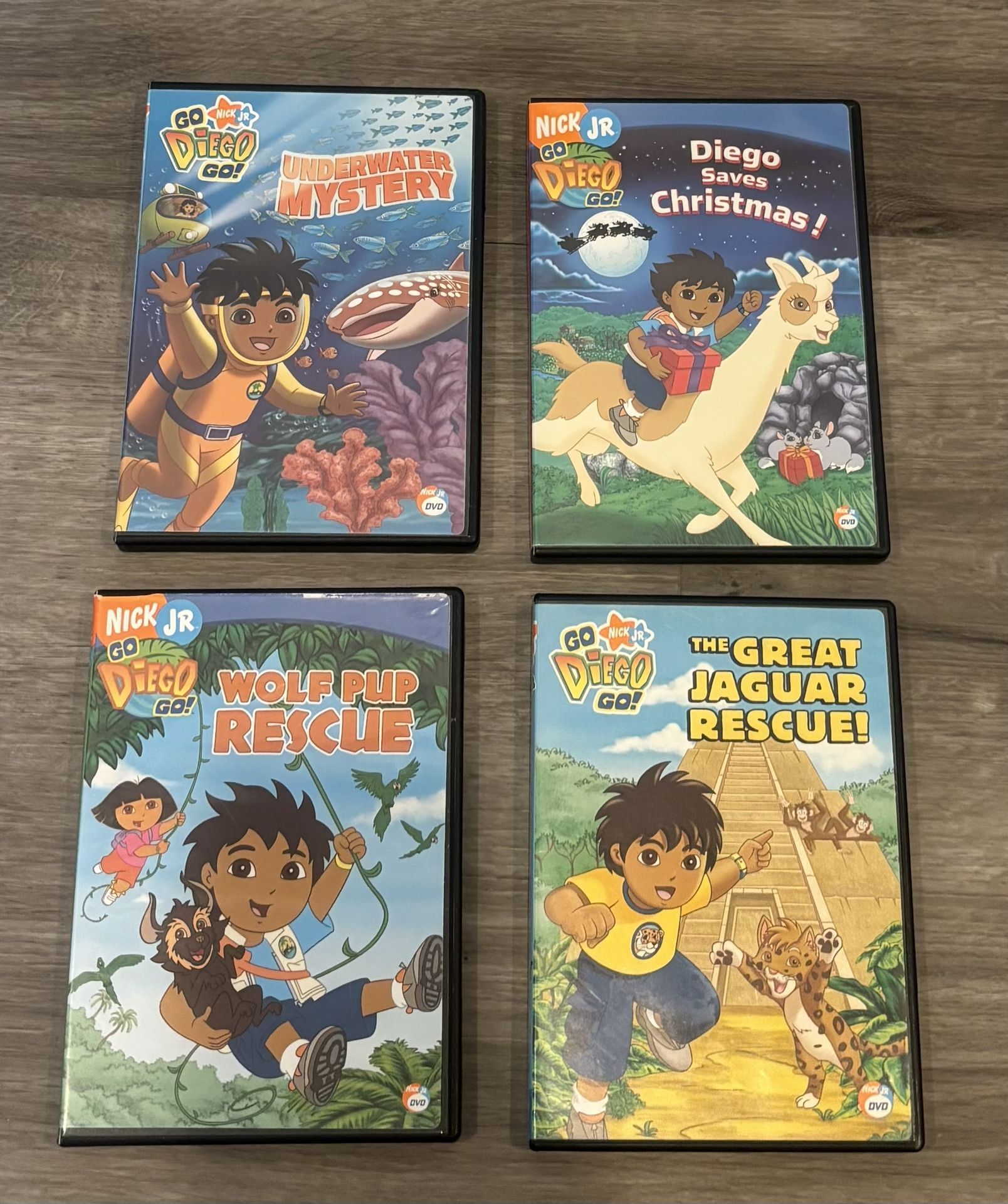 4 Go Diego Go! DVDs Underwater Mystery Diego Saves Christmas Wolf Pup Rescue The Great Jaguar Rescue