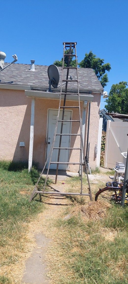 Old Tall Wooden Ladder
