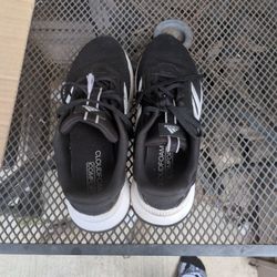 2 Pairs Of shoes 1 Adidas 1 Nike 