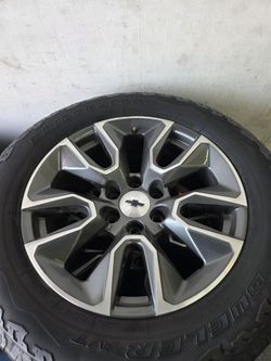 20" Chevy Silverado OEM rims Bridgestone tires