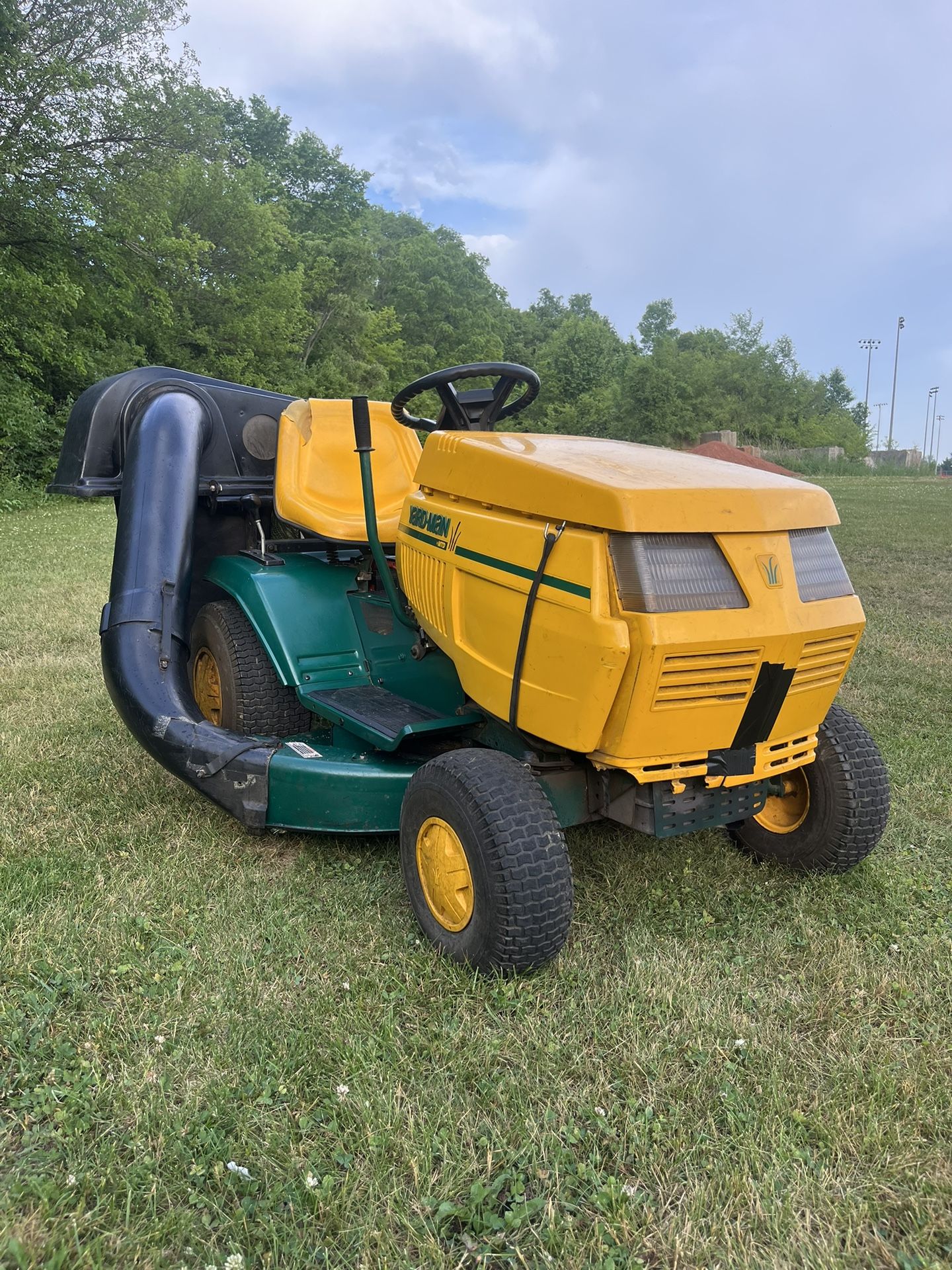 Yard-Man Garden Tractor riding mower with removable bagging system. 15 HP Kohler engine, 42” deck, removable 2-bag bagger. Has a Hydrostatic transmiss