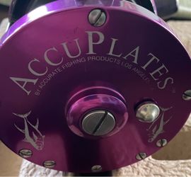 PENN 4/0 with complete Accufrsmes/Accuplstes kit in black and purple