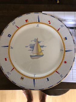 Large serving plate and three smaller serving plates