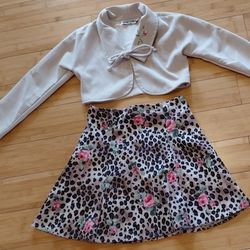 2 peice outfit and 1 skirt with flowers size 12 all $17