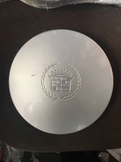 Cadillac deville silver center cap
