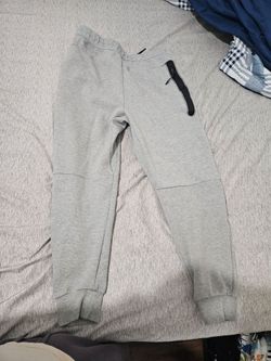 Nike sweatpants.  Light grey