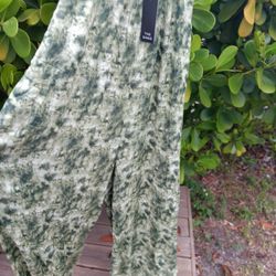 The SANG BREEZY ROMPER LONG WITH POCKETS SIZE M