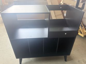 Black Modern Storage Console.Dimensions: 27.6” W × 9.8” D × 35.4” H